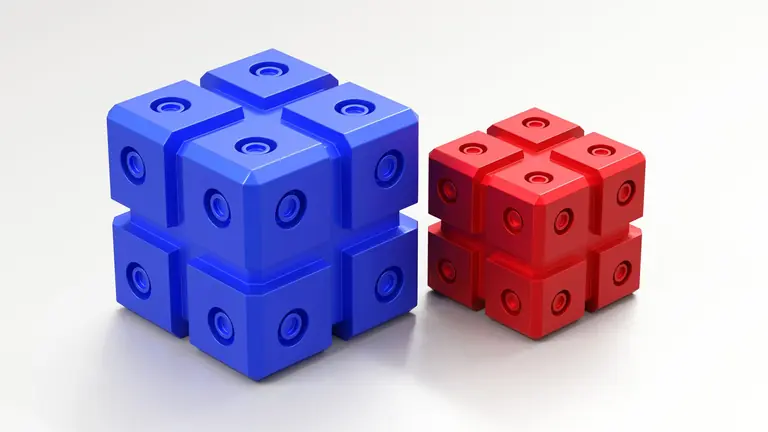 A vibrant render of geometric blue and red cubes with circular indentations on a white surface.